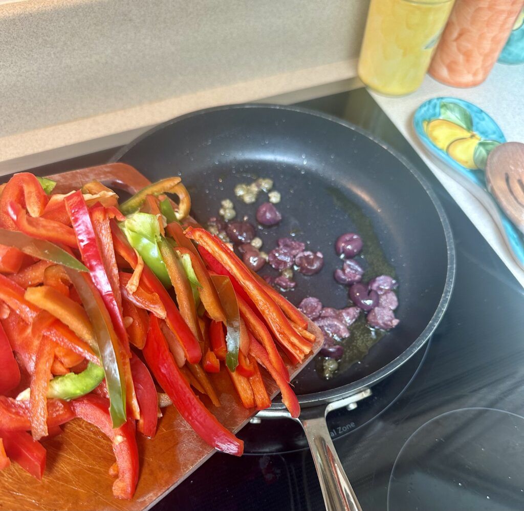 Adding the bell peppers